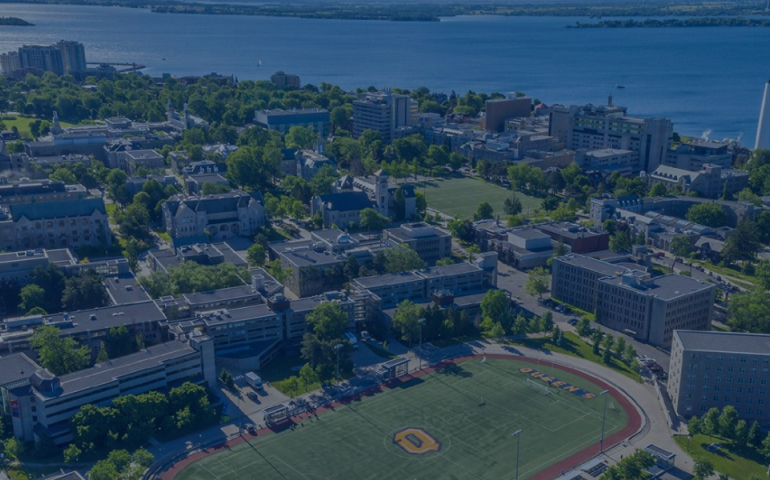 decorative image banner showing an aerial view of Queen's campus
