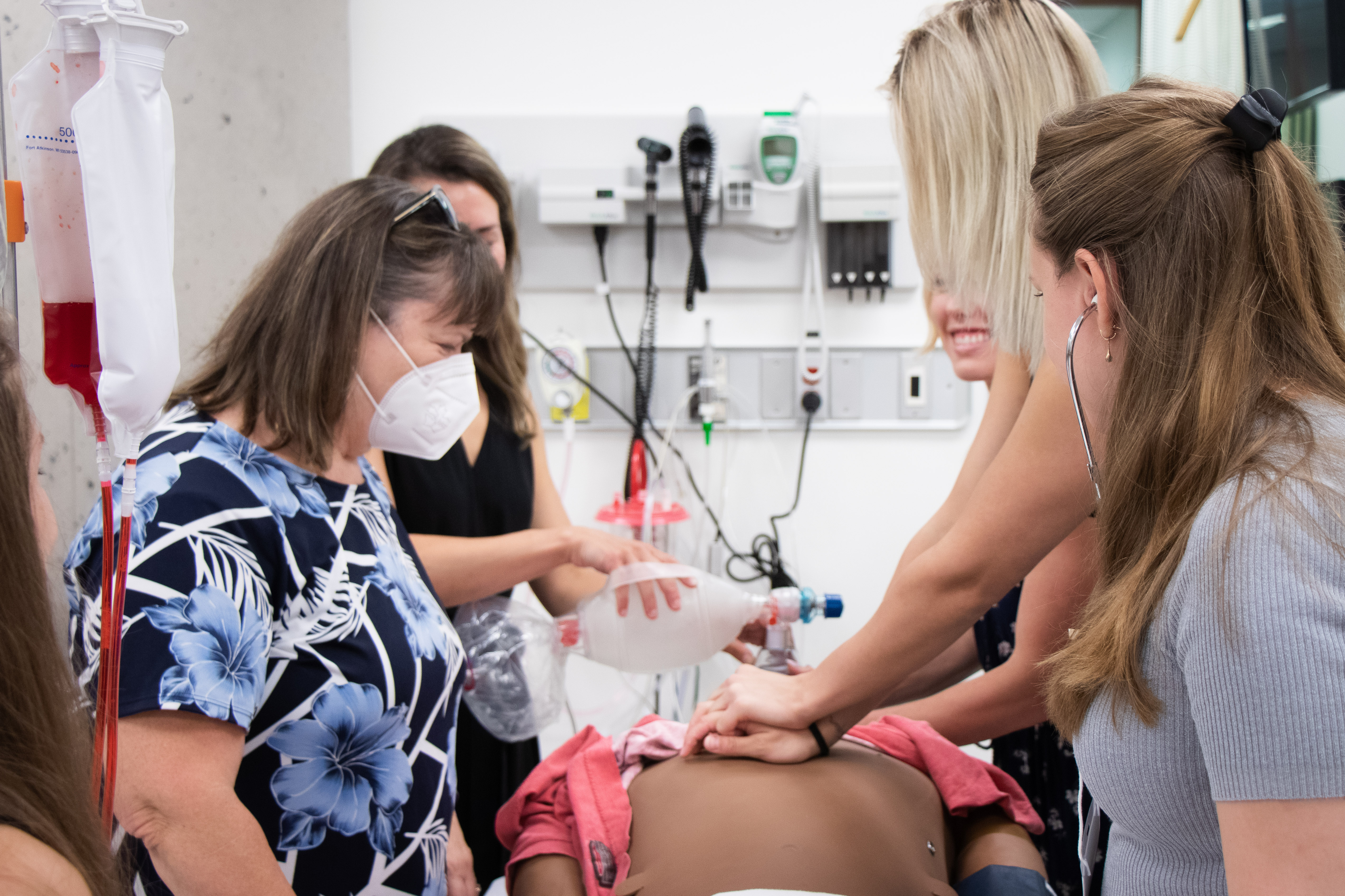 
                         How to Apply to MHPE                                                    - 
                          Learners in the Simulation Lab during the 2022 on-campus intensive.                                                    