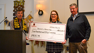 Jane Philpott receiving a cheque