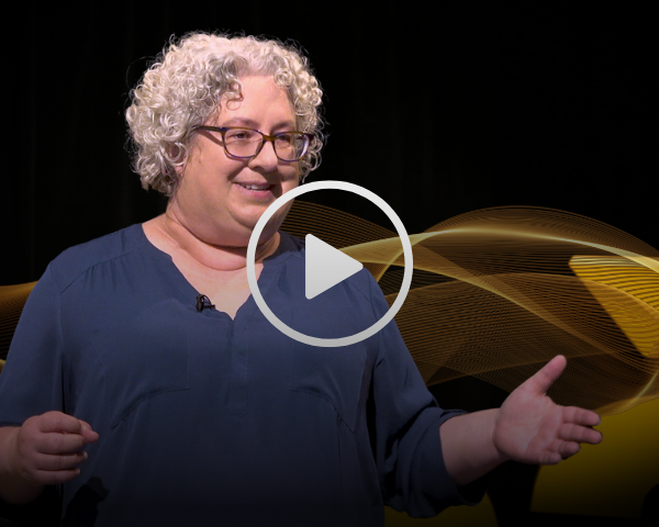 Dr. Michelle Gibson with You Tube play button overlay