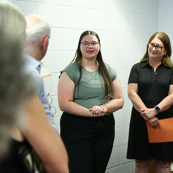 Nursing student addressing the crowd