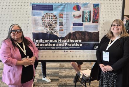 Denise Stockley and Georgina Riel in front of their poster at the STLHE Conference